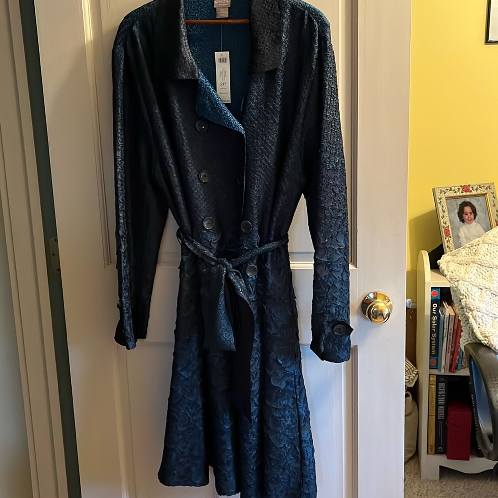 Chicos travelers crushed trench coat.  Teal and black color, very stretchy!